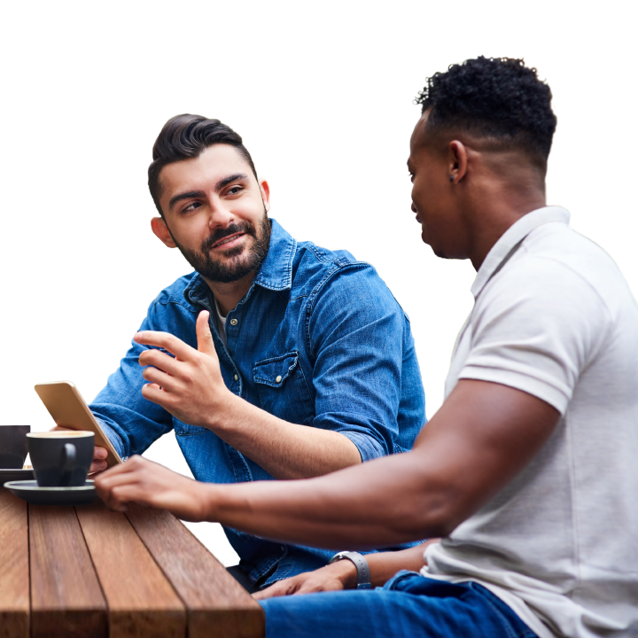 two men chatting over coffee